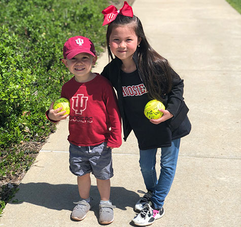Picture of a kids at IU Women's Softball game